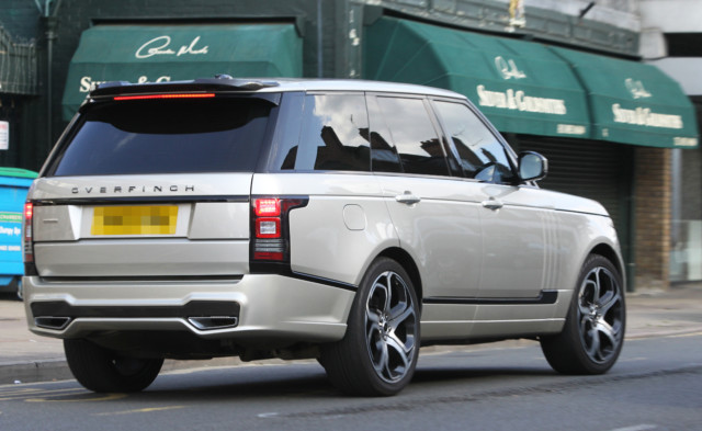 A custom made gold Range Rover Overfinch is Terry's family car