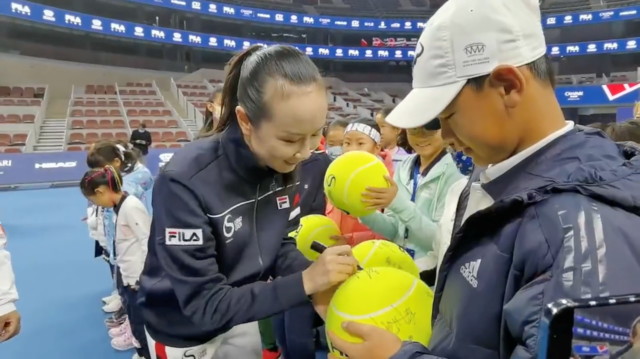 , Tennis star Peng Shuai pictured ‘signing balls at junior event in Beijing’ amid fears for missing Chinese ace