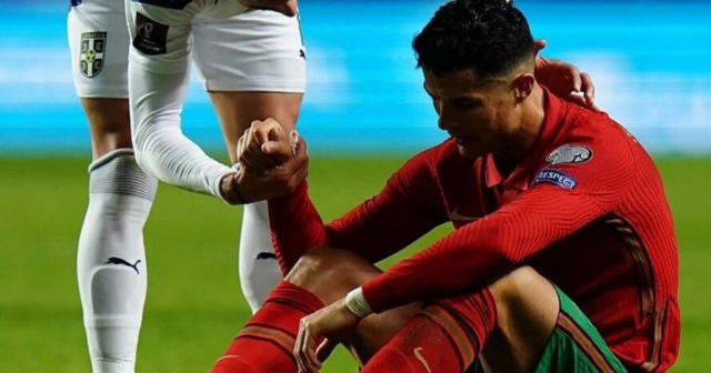 , Cristiano Ronaldo consoled by the ‘Serbian Cristiano’ who helped inflict World Cup qualifying loss on Man Utd star