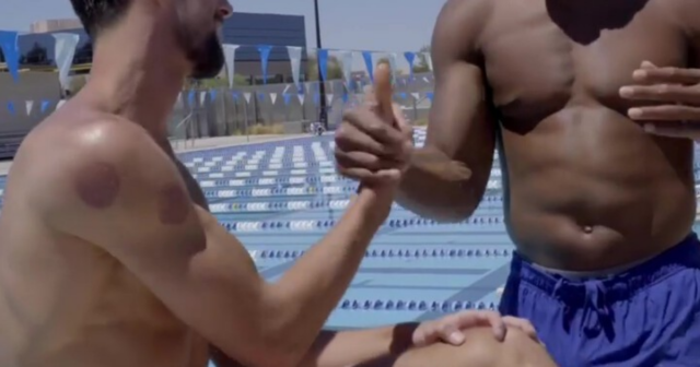 , Watch Anthony Joshua race Olympic legend Michael Phelps as Adam Peaty jokes he needs to work on his dive