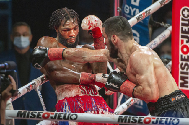 , Artur Beterbiev shows off horror gash pouring with blood after nasty clash of heads during brutal Marcus Browne win