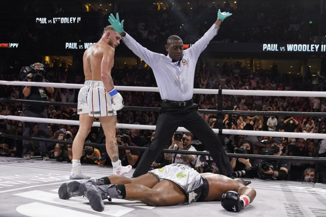 , Jake Paul trolls ‘b****’ Tommy Fury with customised Union Jack walkout attire and blasts rival after Tyron Woodley KO
