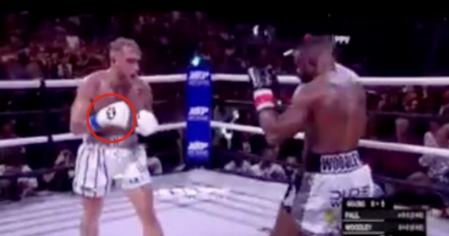 , Jake Paul fight fix claims quashed by Tyron Woodley’s coach after fans thought they’d seen secret hand signal before KO