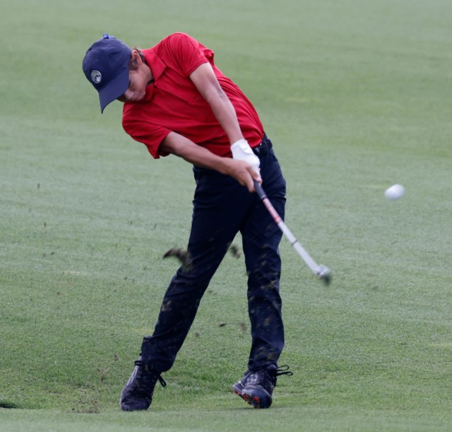 , Charlie Woods is just 12 but shares same iconic swing and on-course mannerisms as golf legend dad Tiger