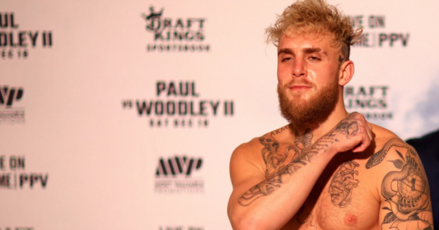 , Jake Paul makes throat-slitting gesture during weigh-in for Tyron Woodley rematch and comes in heavier than first fight