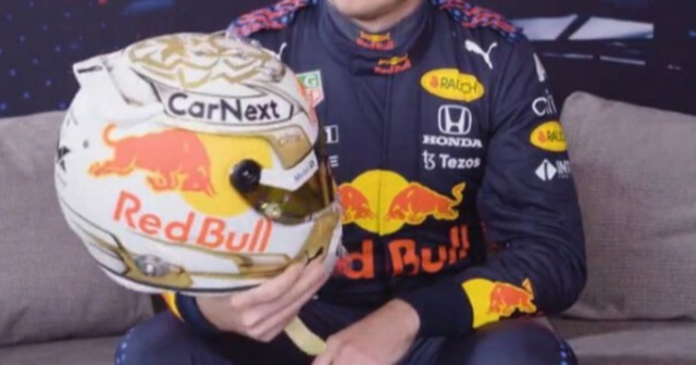 , F1 world champion Max Verstappen reveals new gold helmet design for season ahead as he prepares for Lewis Hamilton fight