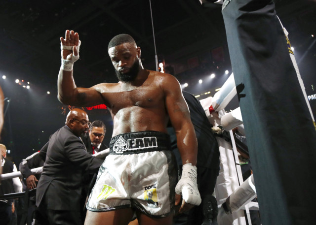 , Woodley says he took a ‘dive’ in Jake Paul rematch but insists it wasn’t ‘on purpose’ as he was ‘hit with some s**t’