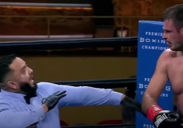 , Watch heavyweight boxer PUNCH referee after being handed controversial loss which saw crowd angry with boos