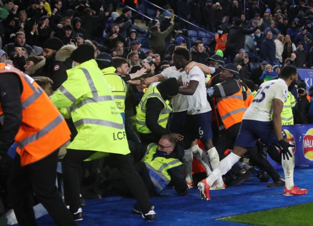 , Moura leaps into steward’s arms as Tottenham celebrate last-gasp comeback win at Leicester as Bergwijn breaks record