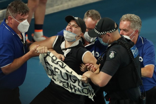 , Security rush on to protect Nadal and Medvedev as Australian Open final stopped by protesting spectator jumping on court