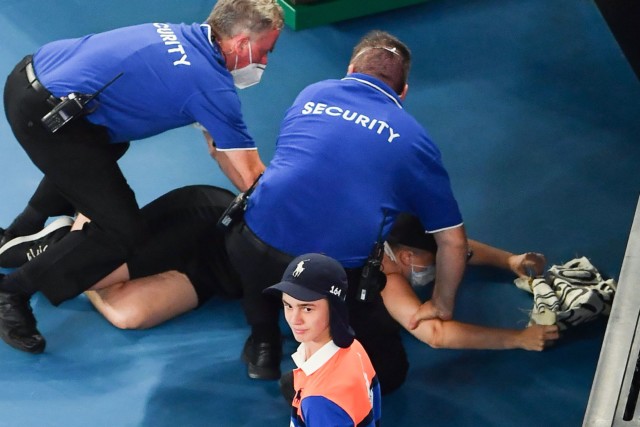 , Security rush on to protect Nadal and Medvedev as Australian Open final stopped by protesting spectator jumping on court