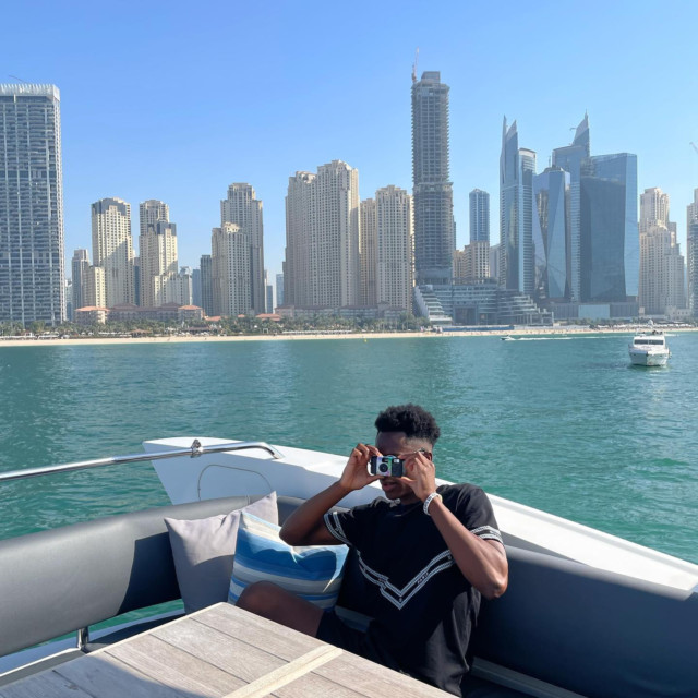 , ‘Enjoy life’ – Arsenal star Albert Sambi Lokonga shows off plush supercar and yacht while on Dubai training break