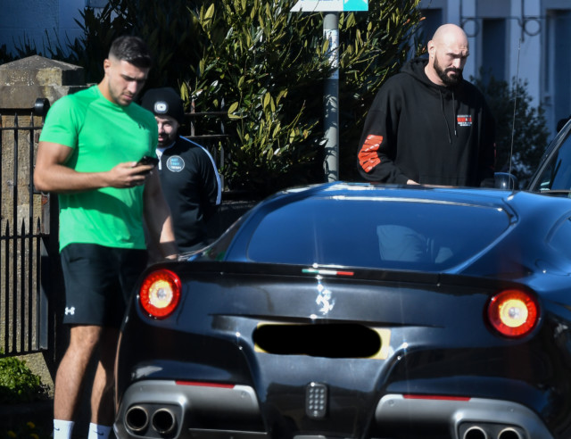, Tyson Fury squeezes into £250,000 Ferrari with 6ft 9inch frame struggling to get into supercar ahead of Whyte fight
