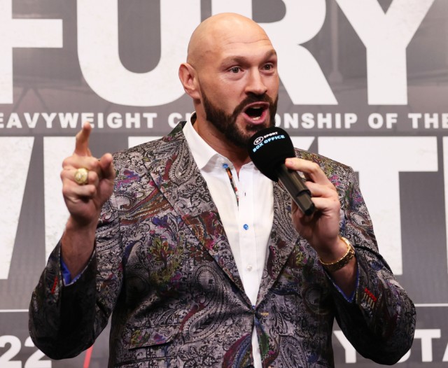 , Watch hilarious moment Tyson Fury stares down a POSTER of Dillian Whyte as opponent fails to attend presser