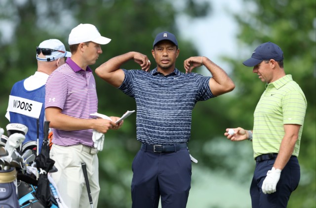 , Tiger Woods almost hit by golf ball and has row with cameraman in eventful first round at PGA Championship