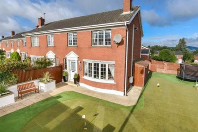 McIlroy's family home was an end-of-terrace house in Holywood with a putting green