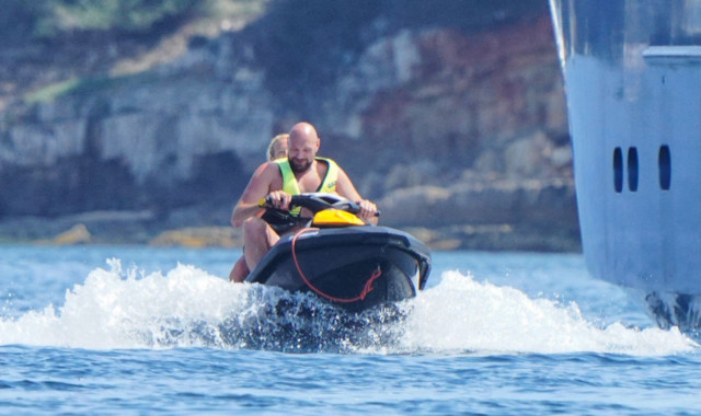 , Tyson Fury and wife Paris cruise the waves on jet skis as boxing champ enjoys luxury holiday aboard superyacht in Cannes