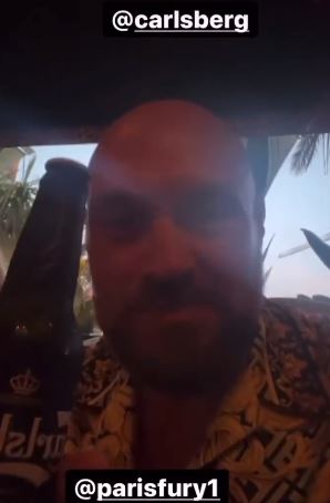 , Tyson Fury enjoys his retirement on holiday as he refuses to lift finger as wife Paris does work and passes him beers