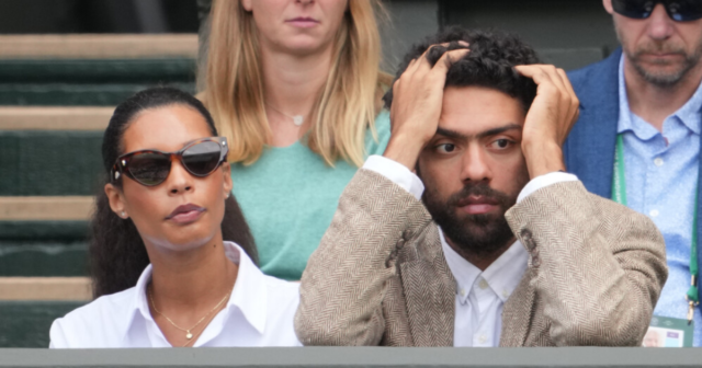 , Boris Becker’s girlfriend Lilly de Carvalho and son Noah watch on at Wimbledon as tennis icon sits in jail for 2.5 years