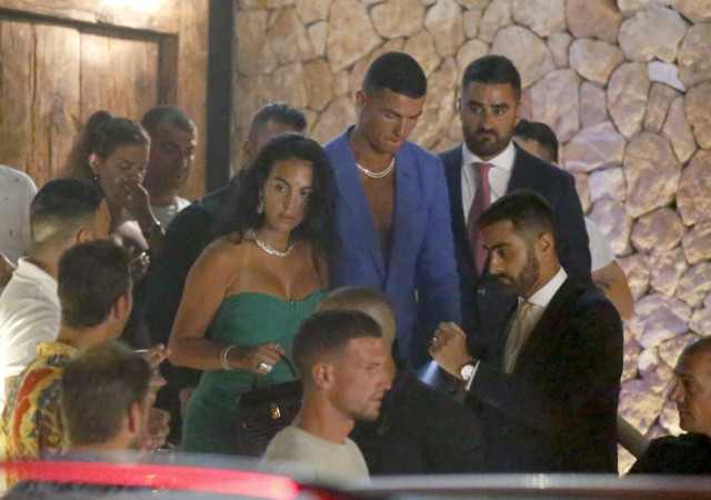 , Cristiano Ronaldo and Georgina Rodriguez can’t keep hands off each other as stunning Wag wears strapless dress on date