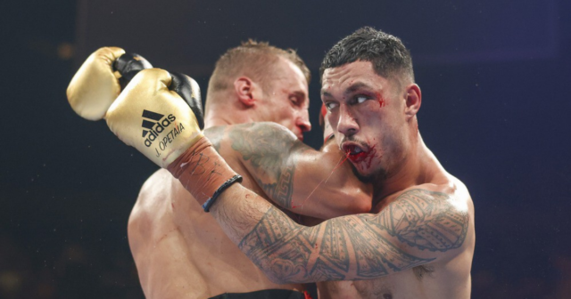 , Boxer Jai Opetaia BREAKS his jaw in second round but carries on to win cruiserweight title on points vs Mairis Briedis