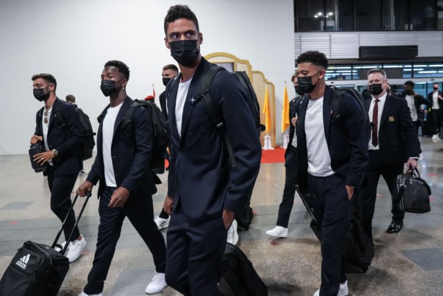 , Man Utd stars look grim faced as they touch down in Thailand without Cristiano Ronaldo for pre-season tour