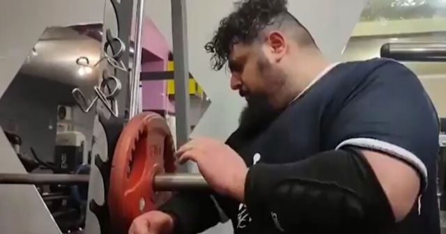 , Watch Iranian Hulk in bizarre training routine for Kazakh Titan fight that includes punching a metal weight