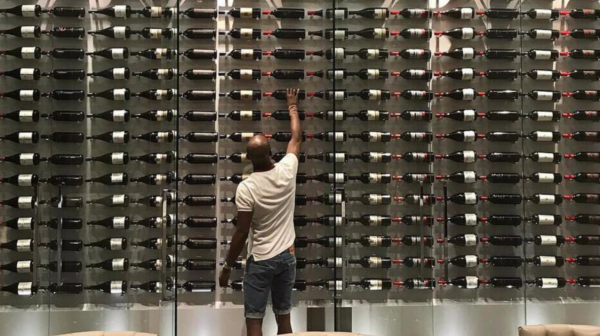 , Boxing legend Floyd Mayweather boasts £19m LA mega mansion with stunning belt collection and incredible wine cellar