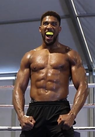 , Watch hench Anthony Joshua’s gruelling wrist exercise as he shows off incredible physique in training for Usyk fight
