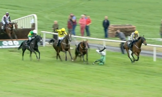 , Watch jockey’s bone-crunching head-first fall as final fence disaster sees him miss out on £100,000