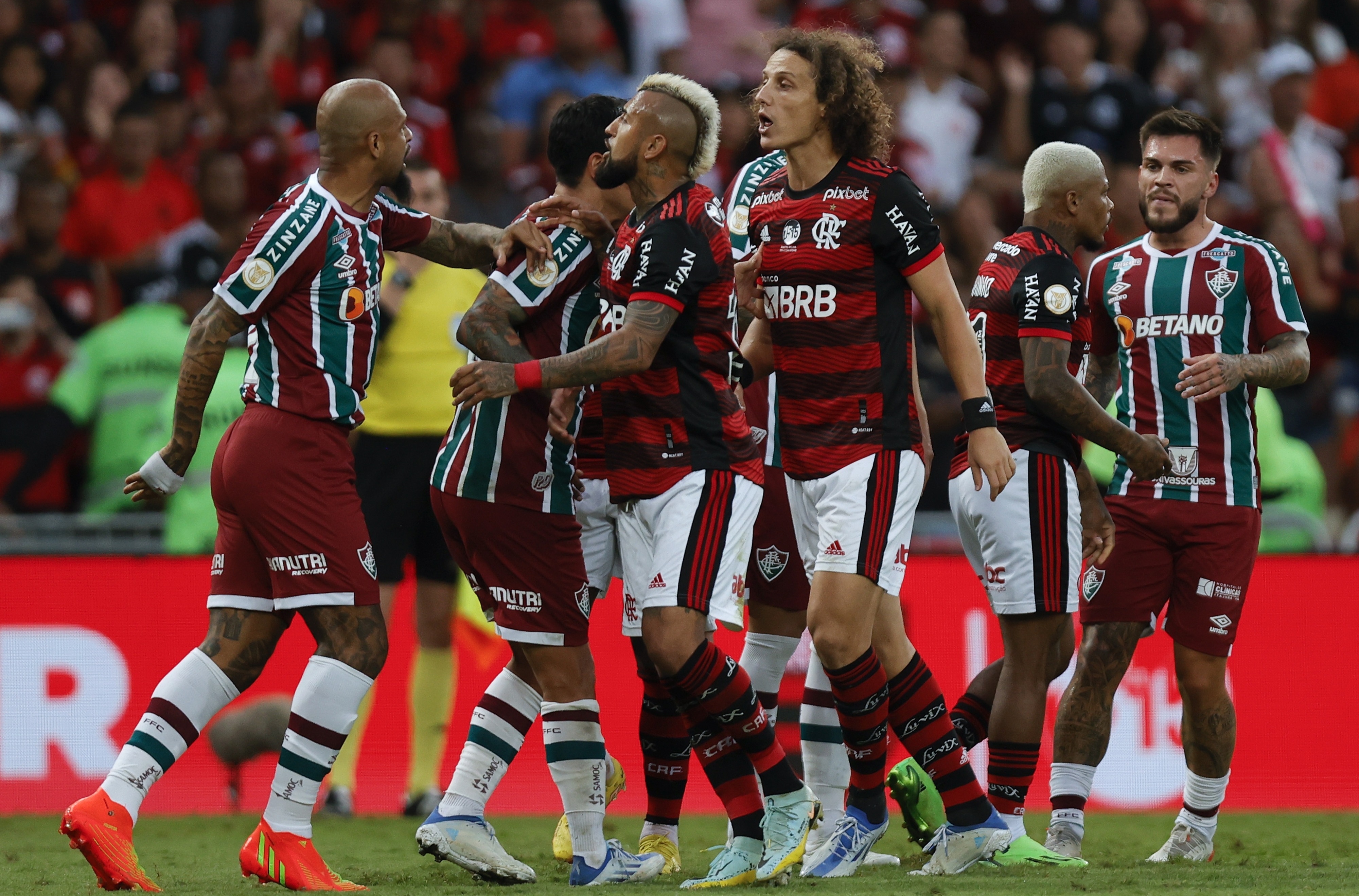 , Watch furious ex-Arsenal ace David Luiz square up to Fluminense bad-boy Felipe Melo as FIVE sent off in Flamengo derby