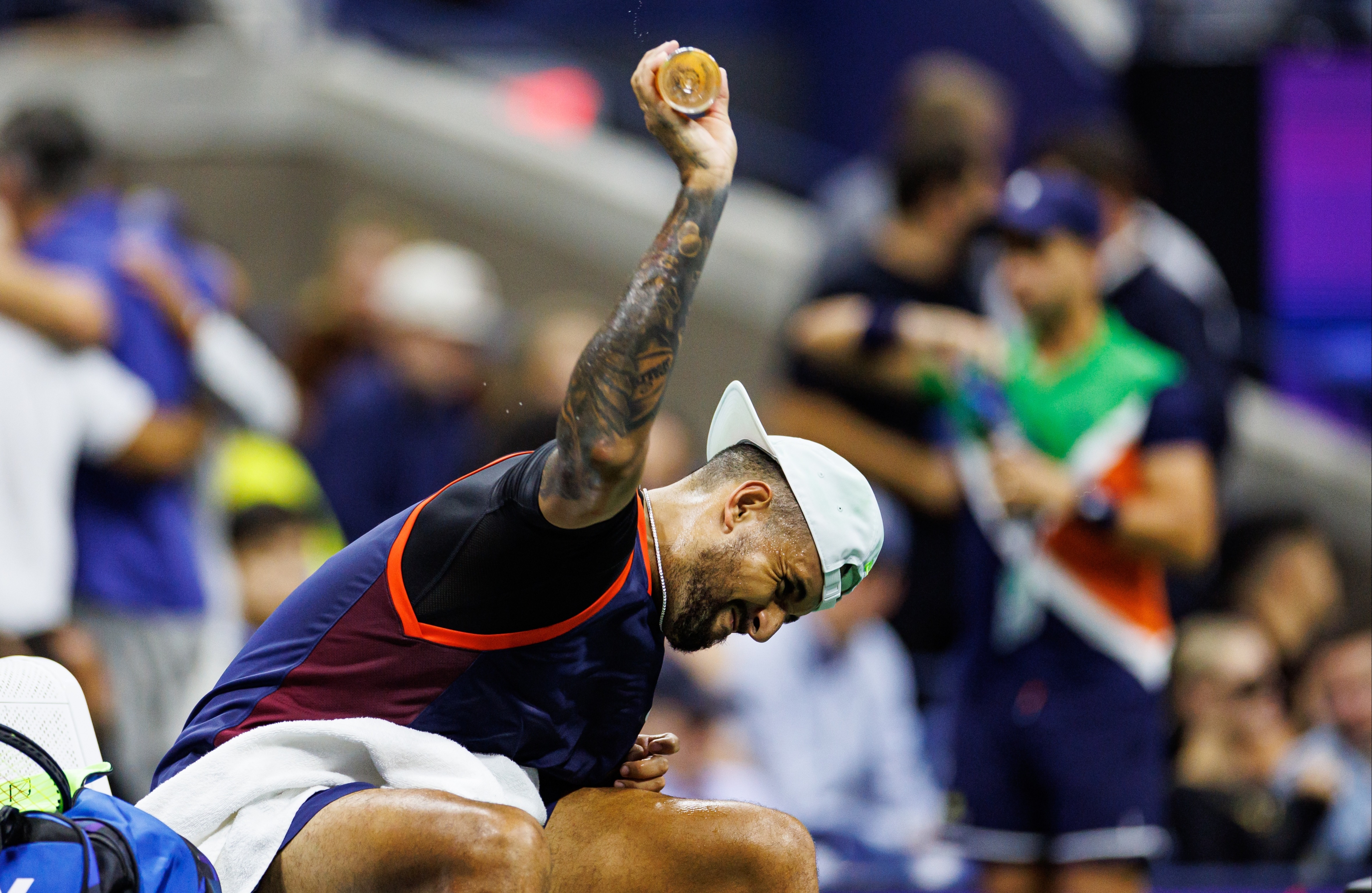 , Nick Kyrgios clashes with fans, smashes racket, throws bottle on court and spits towards his team after US Open defeat