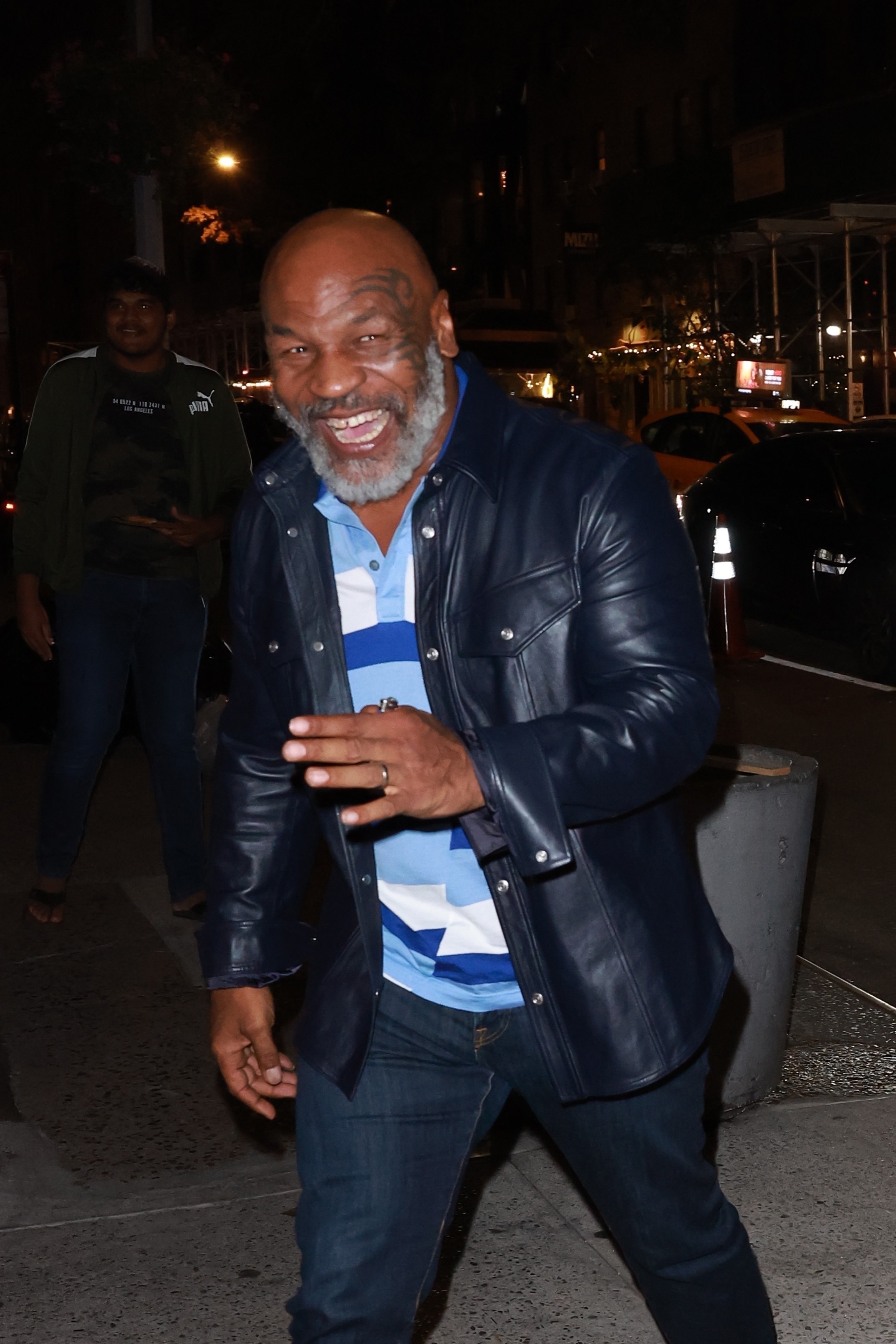 , Mike Tyson, 56, in good spirits while out for dinner with woman after struggling to walk or talk due to health battle