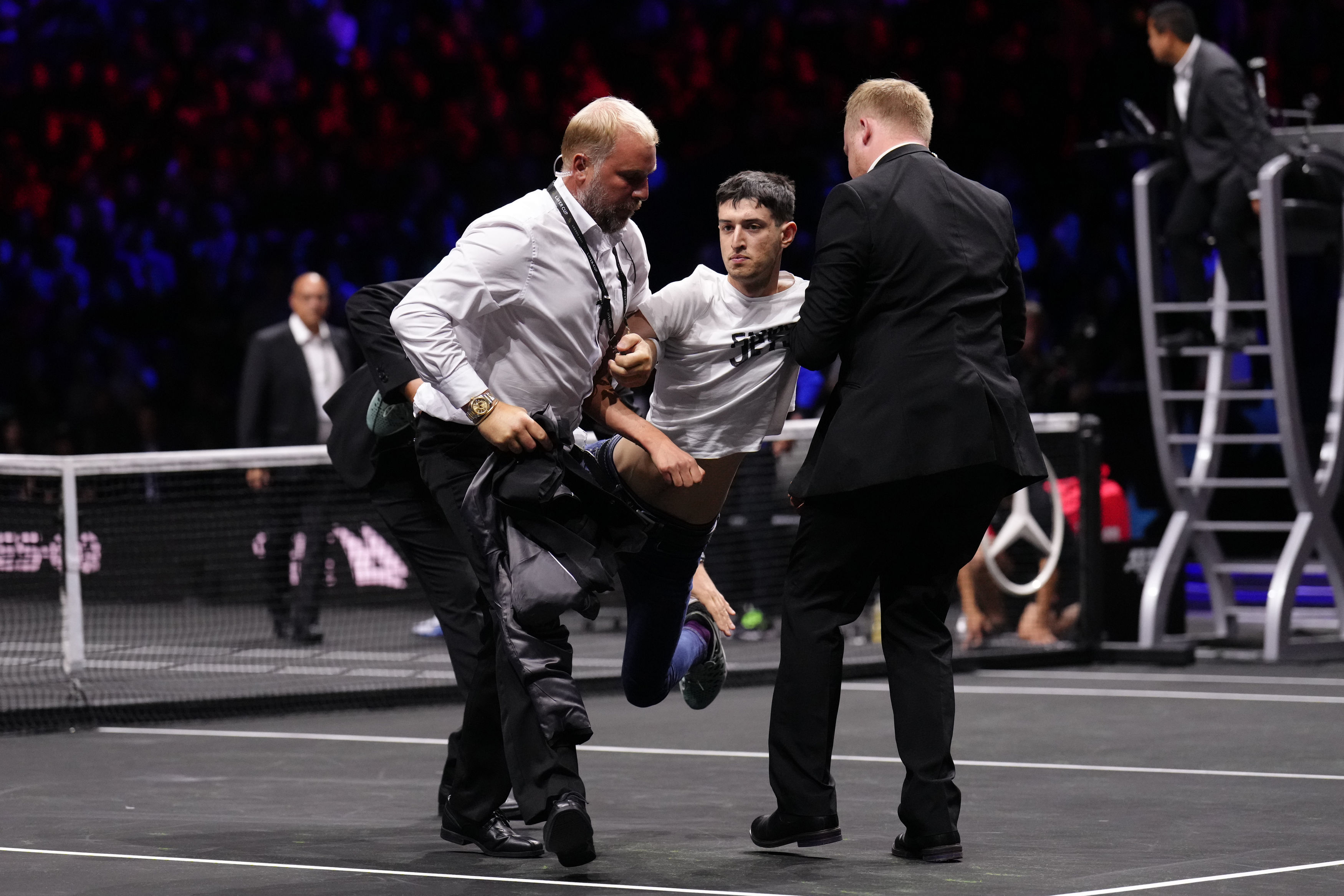 , Bizarre moment idiot sets himself on FIRE before getting carried out by security at Laver Cup at O2 Arena
