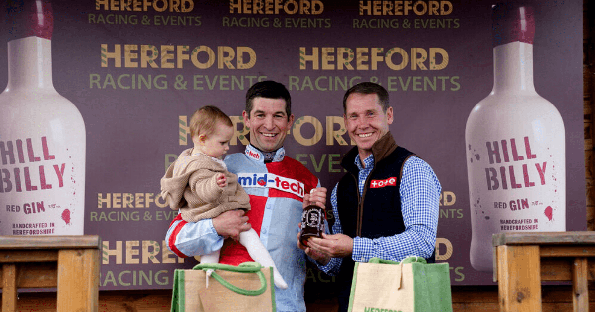 , Smiling Robbie Dunne celebrates first winner back after bully ban with baby daughter at Hereford