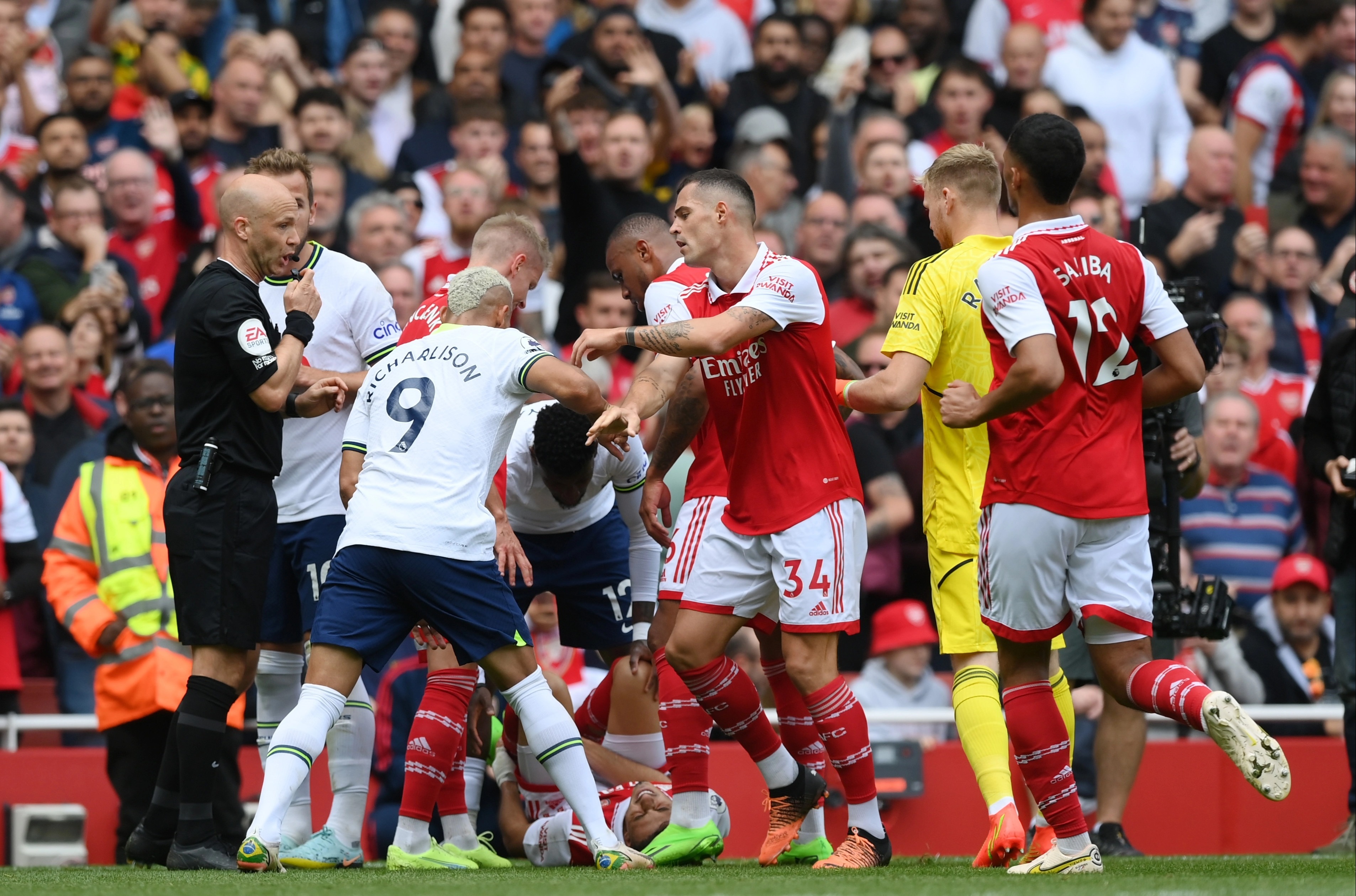 , Tottenham star Emerson Royal shown straight red card for horror challenge on Arsenal’s Gabriel Martinelli sparking clash