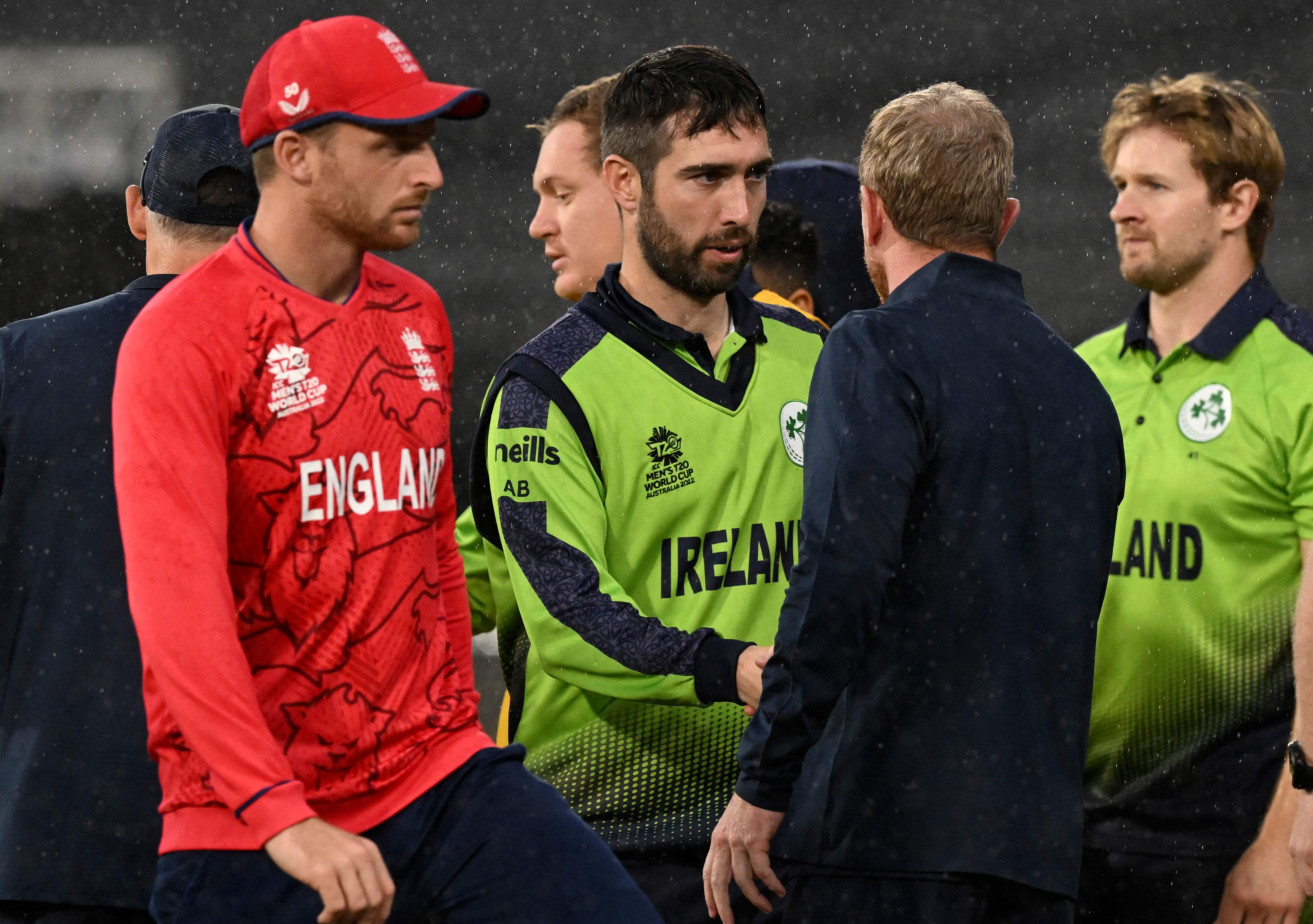 , England stunned by Ireland in shock World Cup defeat as rain stops play at MCG with Buttler’s side 5 runs behind on DLS