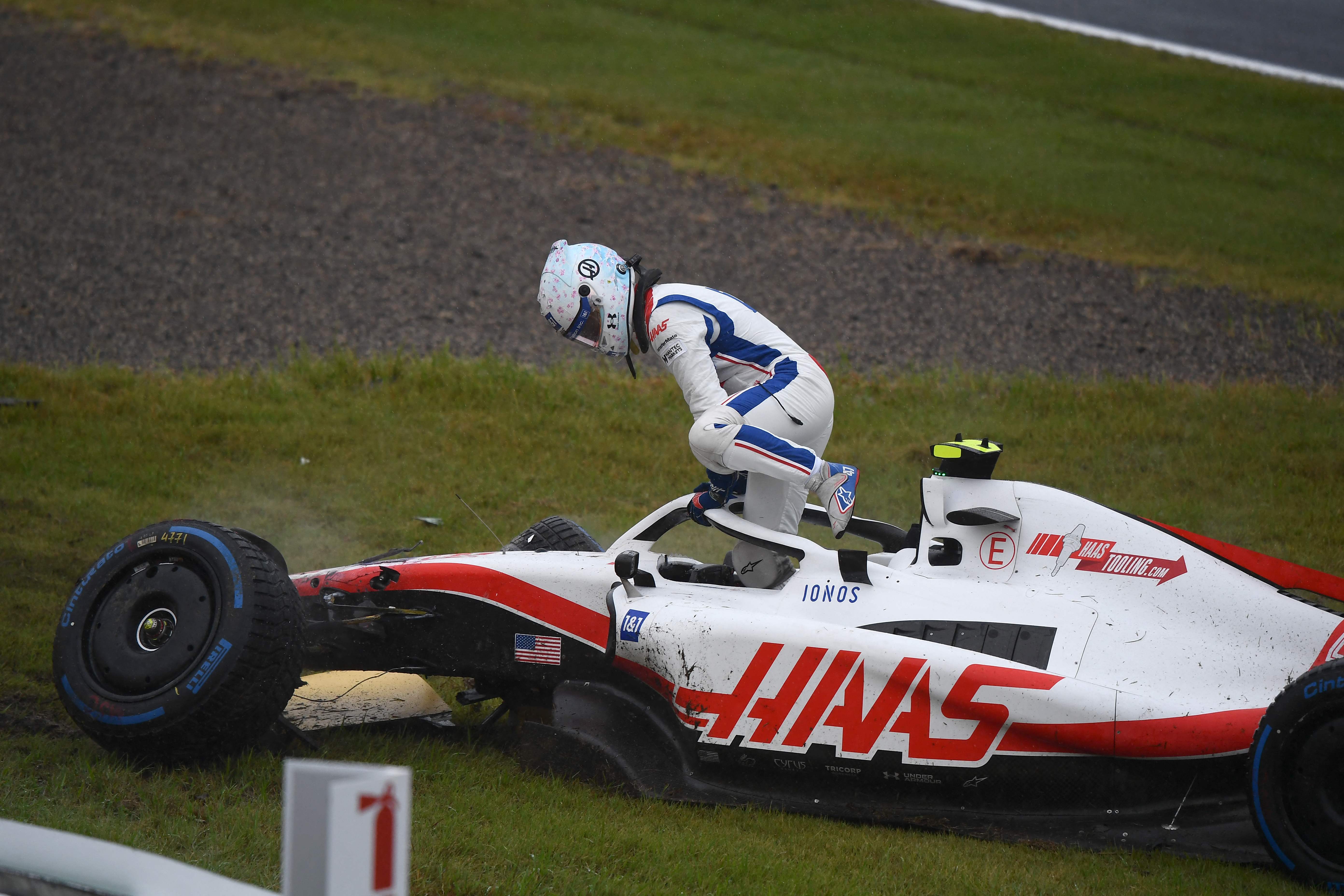 , Watch as Mick Schumacher CRASHES out of Japanese GP practice and destroys car as torrential rain soaks track