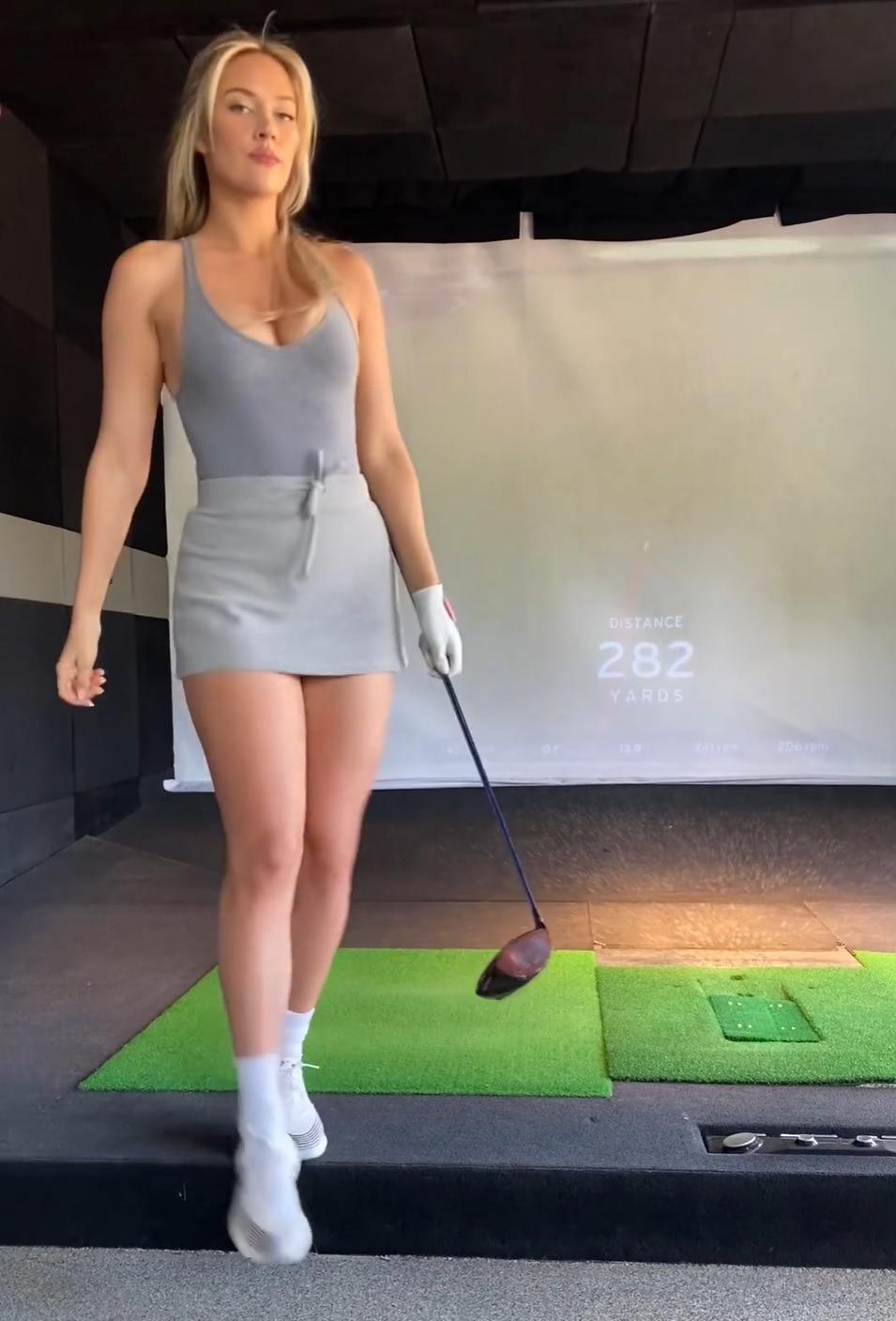 , Paige Spiranac crashes huge 300-yard drive on simulator as golf beauty shows she still has incredible skills