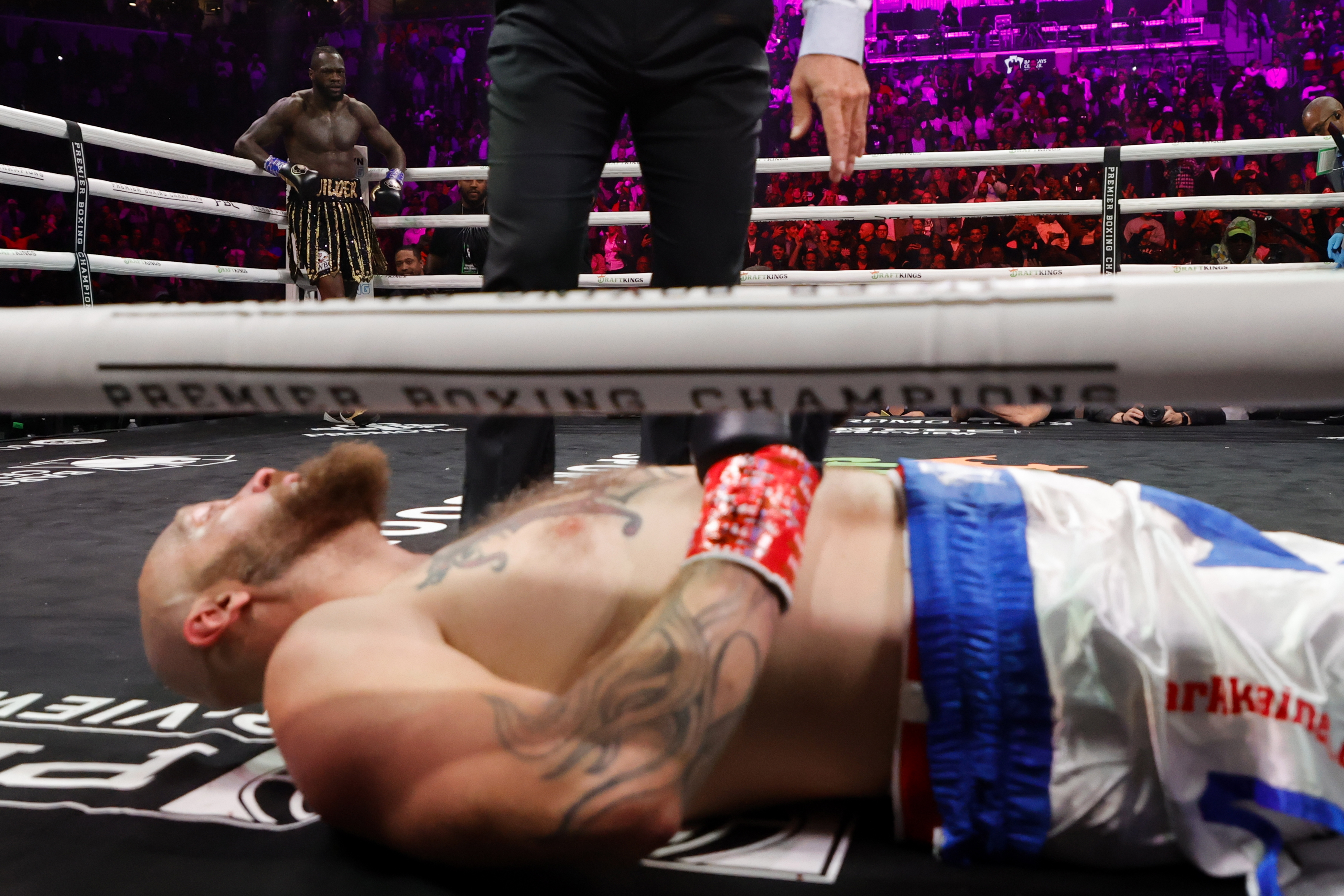 , Watch Deontay Wilder break down in tears after knocking out Robert Helenius as he reveals fear for brain damaged boxers