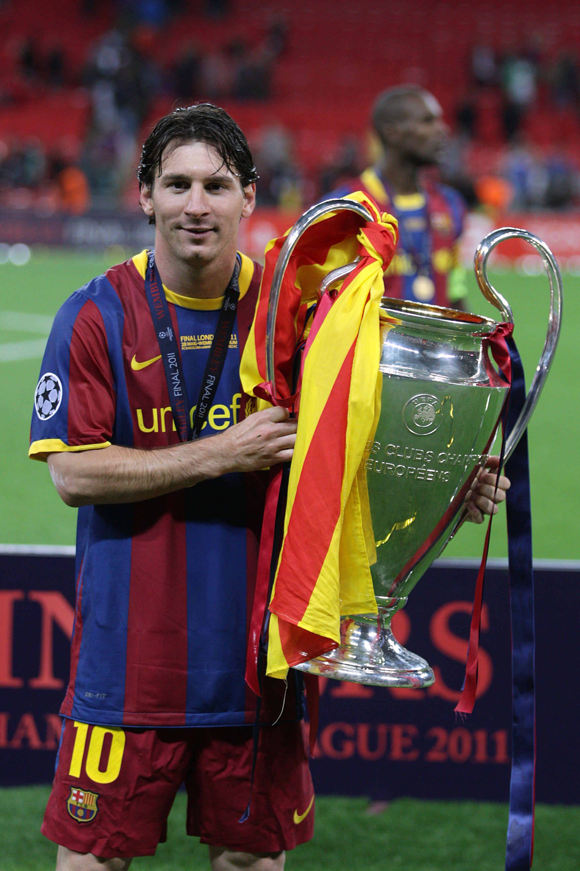 Lionel Messi with his third Champions League medal, won at Wembley in 2011