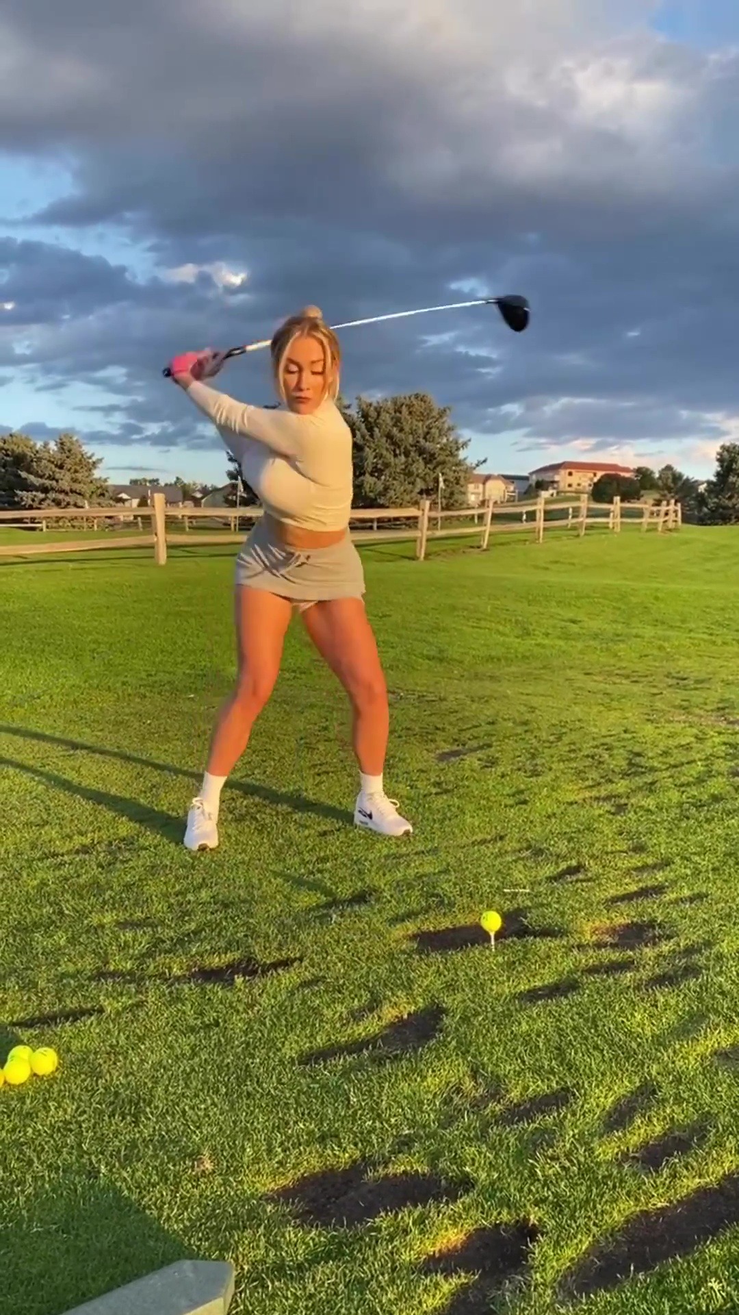 , Watch Paige Spiranac’s driving technique as she smashes golf ball while wearing figure-hugging top and mini-skirt