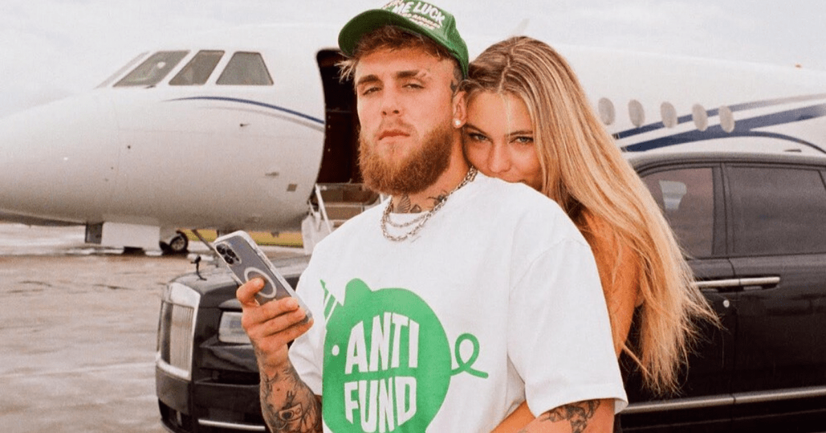 , Jake Paul looks loved-up as he poses outside private jet with world’s hottest speed skater girlfriend and pet dog
