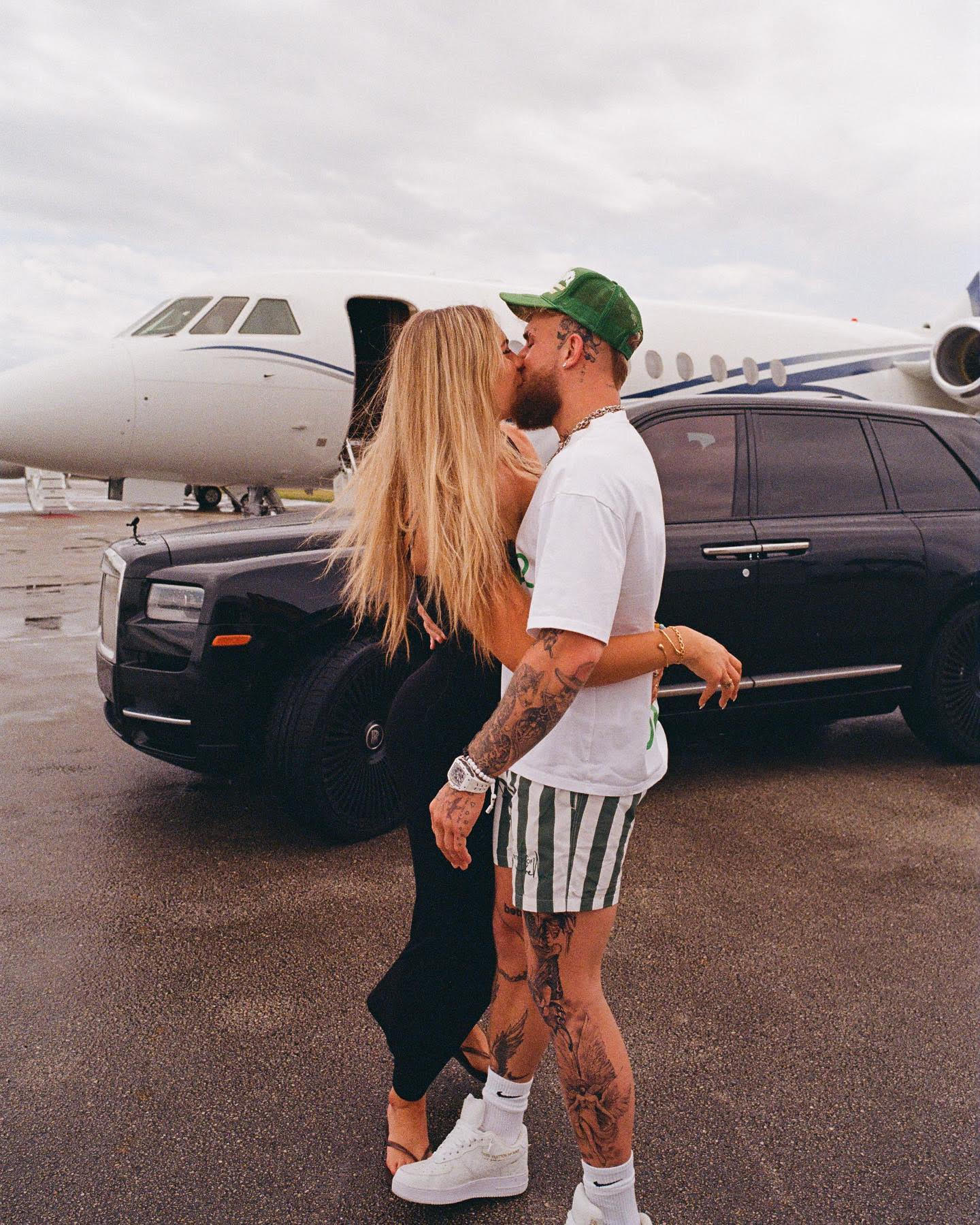 , Jake Paul looks loved-up as he poses outside private jet with world’s hottest speed skater girlfriend and pet dog