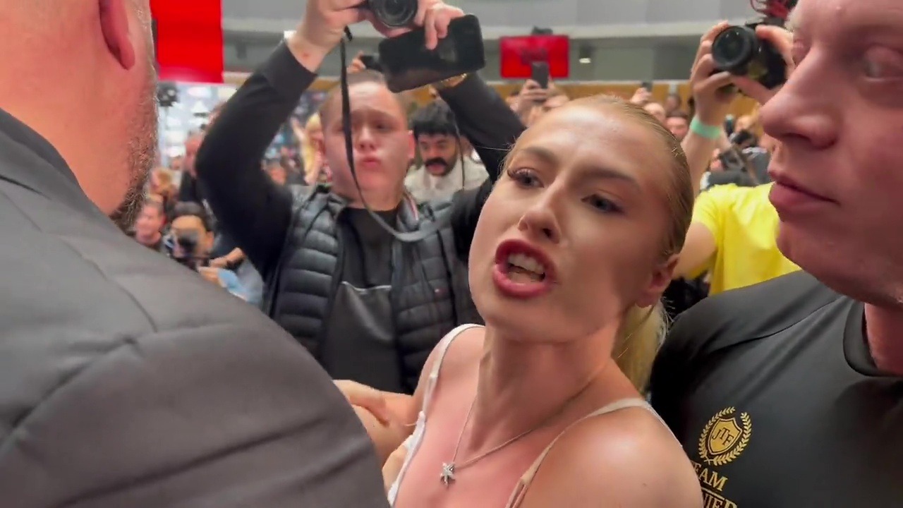 , Astrid Wett narrowly avoids wardrobe malfunction as she’s attacked by OnlyFans rival at KSI press conference