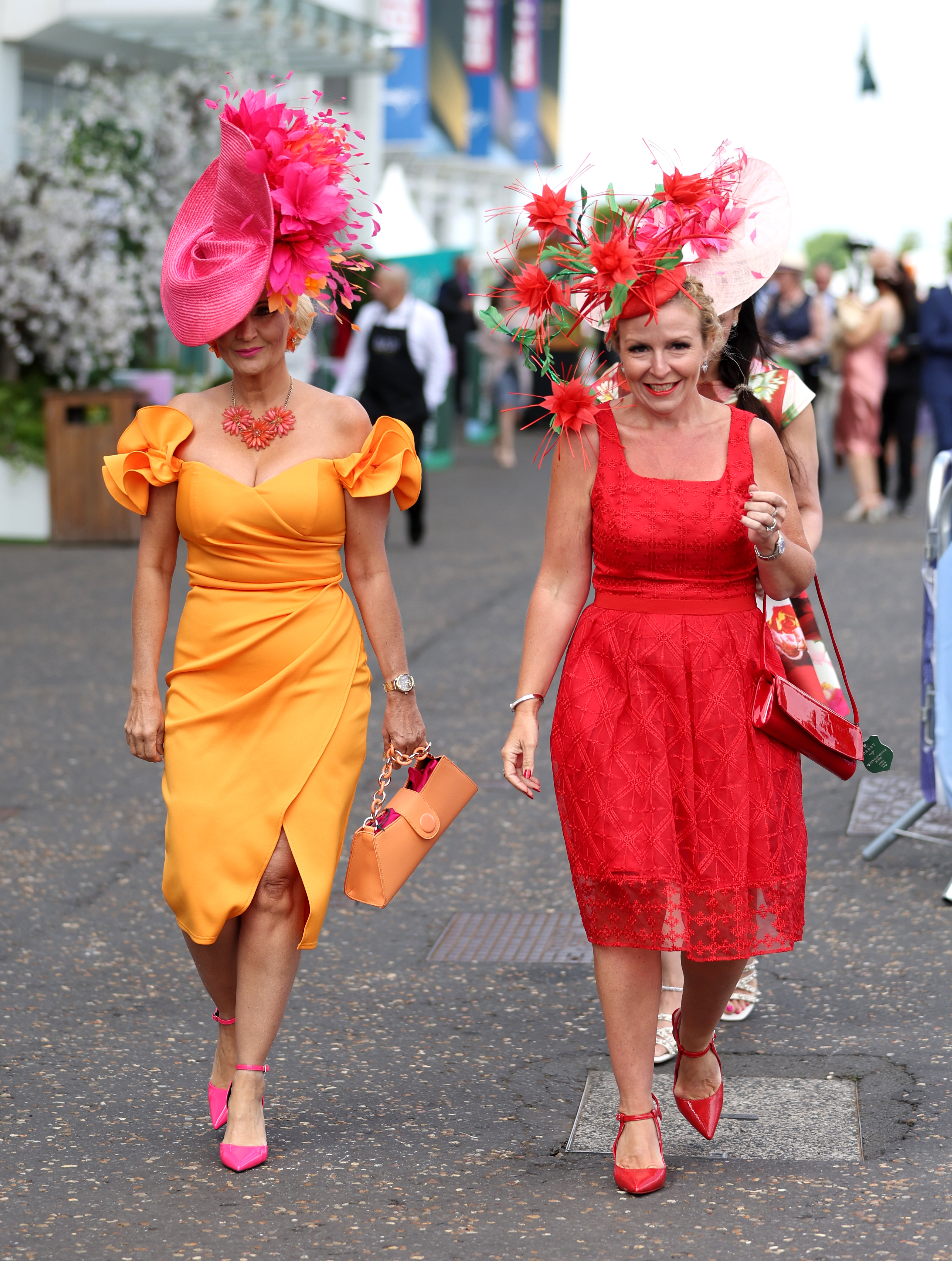 , Stylish racegoers pull out all the stops at Epsom racecourse for Ladies Day with glam dresses and eye-catching hats