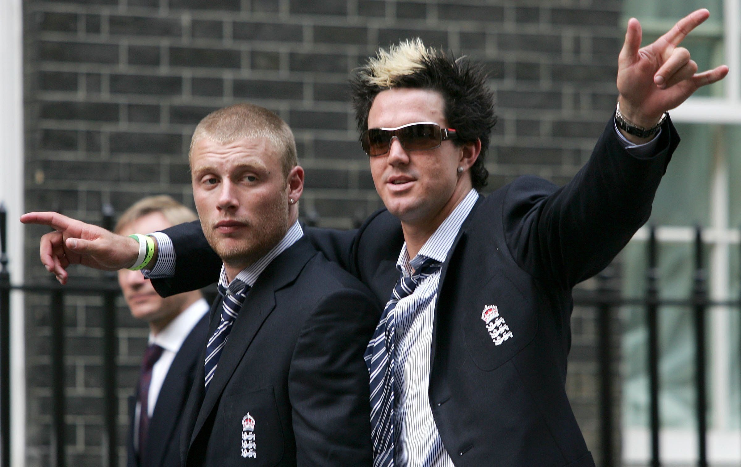 England cricketers Kevin Pietersen, right, and Andrew Flintoff arrive at 10 Downing Street to meet Prime Minister Tony Blair in London, Tuesday Sept, 13, 2005. (AP Photo/Sergio Dionisio)