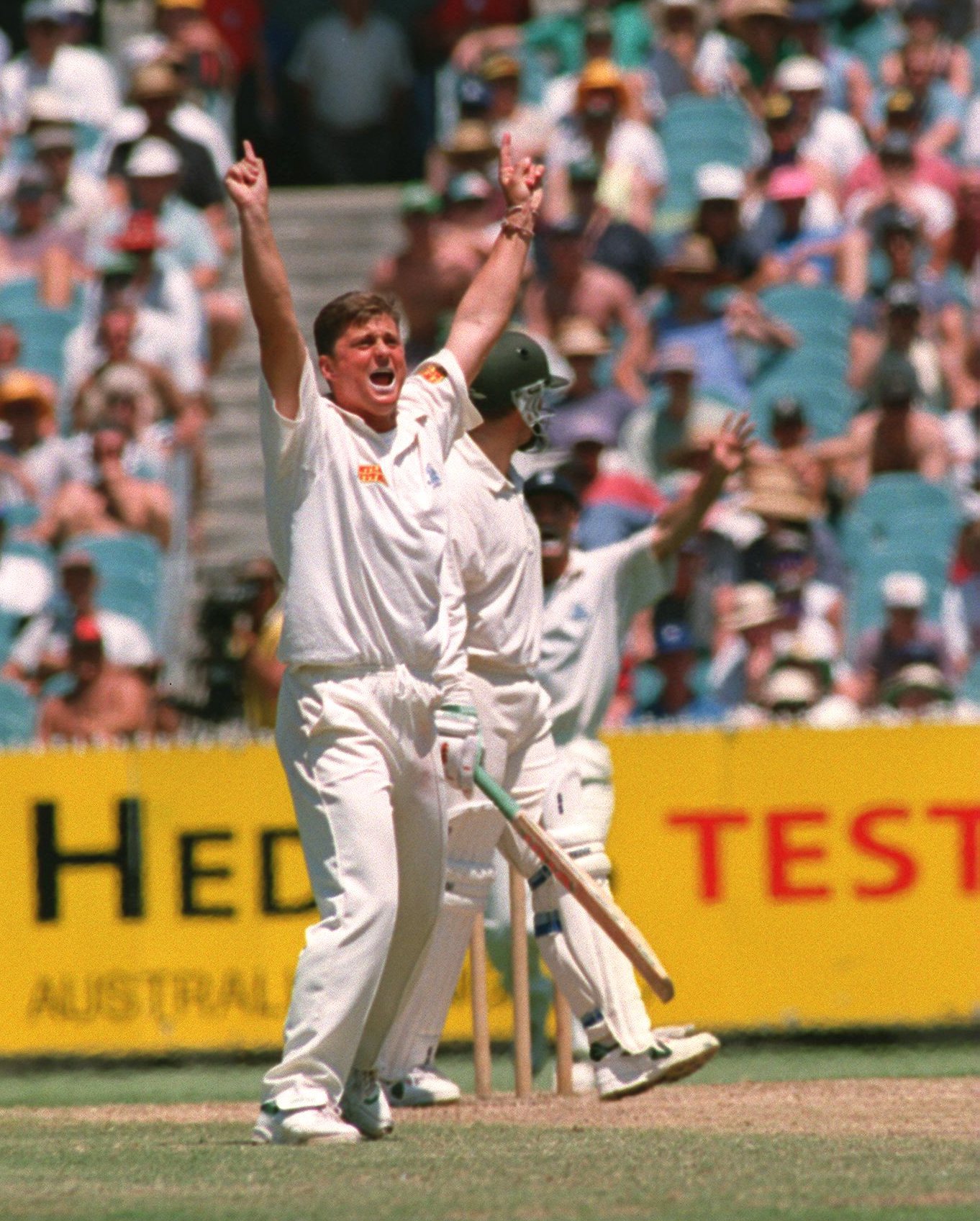 27 DEC 1994: DARREN GOUGH OF ENGLAND CELEBRATES TAKING THE WICKET OF AUSTRALIAN CAPTAIN MARK TAYLOR DURING THE THIRD DAYS PLAY OF THE SECOND TEST MATCH AGAINST AUSTRALIA IN MELBOURNE. Mandatory Credit: Graham Chadwick/ALLSPORT