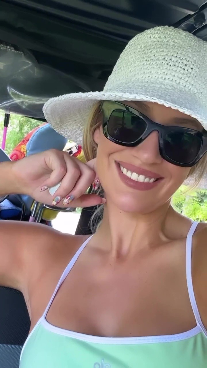 , Paige Spiranac checks out her boobs in revealing outfit on golf course leaving friend baffled