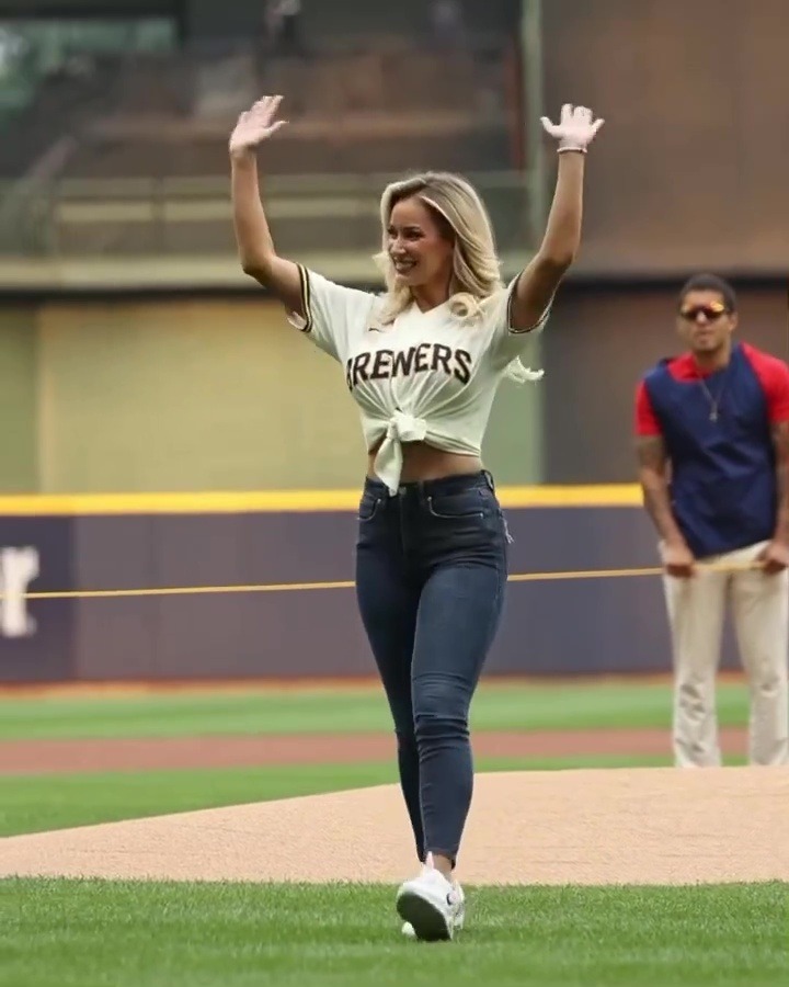 Paige Spiranac stuns baseball fans in unbuttoned shirt as she throws ...